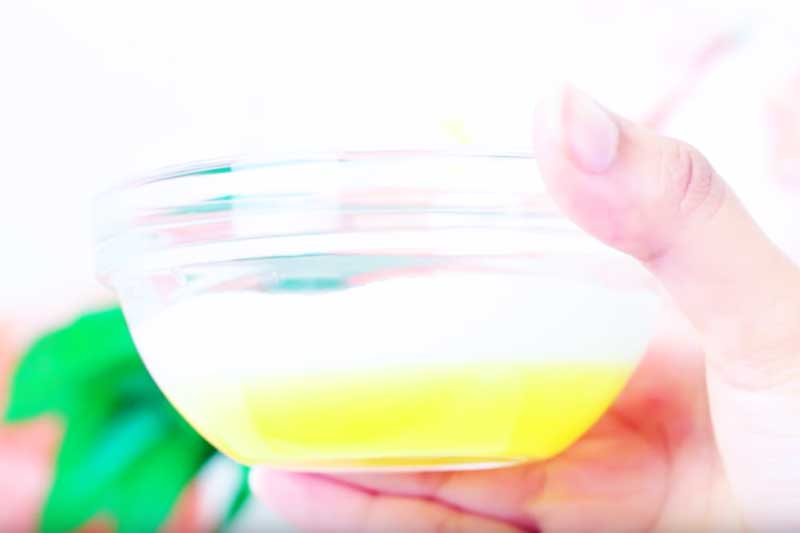 close up of the yellow mask mix in a glass bowl